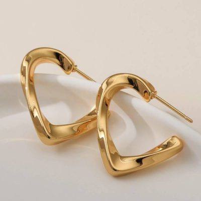18kt gold-plated twisted heart earrings