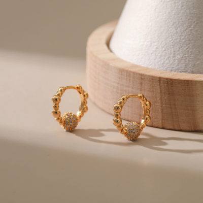 18kt gold-plated huggie earrings